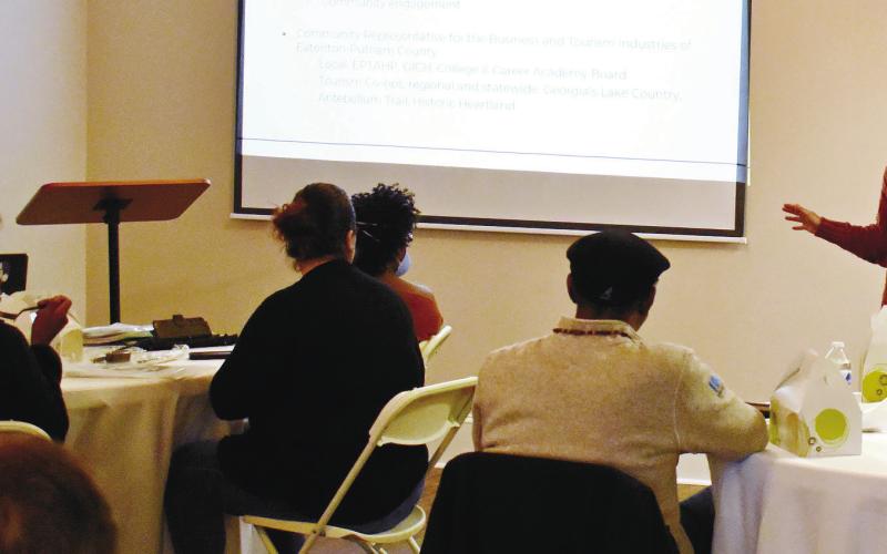 Eatonton-Putnam Chamber of Commerce President Maggie Milner (standing) was the anchor speaker for the Business Education Expo recently presented by Eatonton Main Street. LENA HENSLEY/Staff