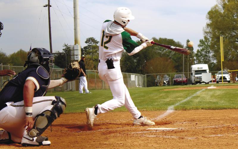 John Wallace Thompson (12) swings for the fences during a recent Gatewood game at home in Eatonton. TREY NORRIS/Staff