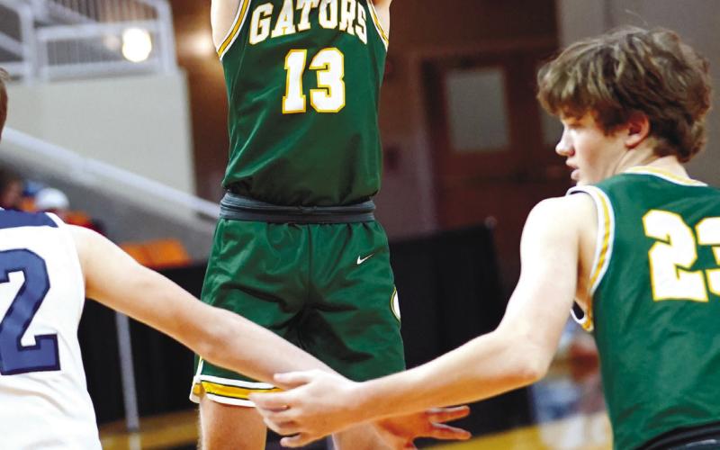 Gators’ junior Kaden Keiser (13) attempts a shot from the 3-point line. DR. BOB BETZEL/Contributed