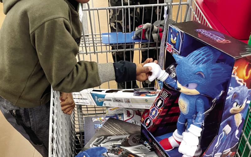 LYNN HOBBS/Staff Six-year-old Khylie Maddox said he is excited with the Sonic the Hedgehog toys because “Sonic is my favorite.” LYNN HOBBS/Staff
