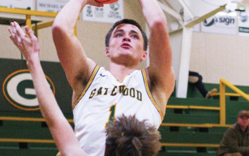 Gatewood senior Ames Johnson had a solid game for the Gators Monday night in his first game back as a basketball player since he was a freshman. IAN TOCHER/Staff