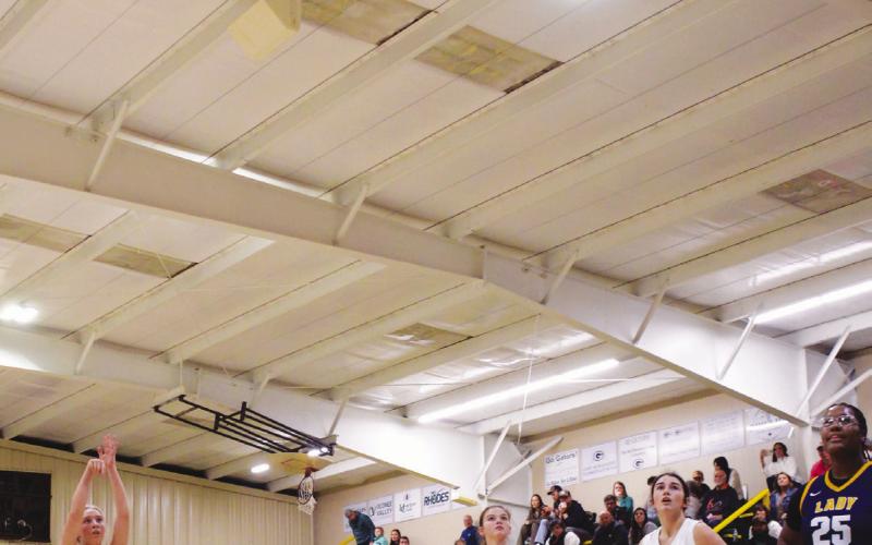 Freshman Bela Smith scored the game-winning basket with this free throw that put the Lady Gators up 33-32 over the visiting Lady Cavs from Mount de Sales. Gatewood won the game 36-32. IAN TOCHER/Staff