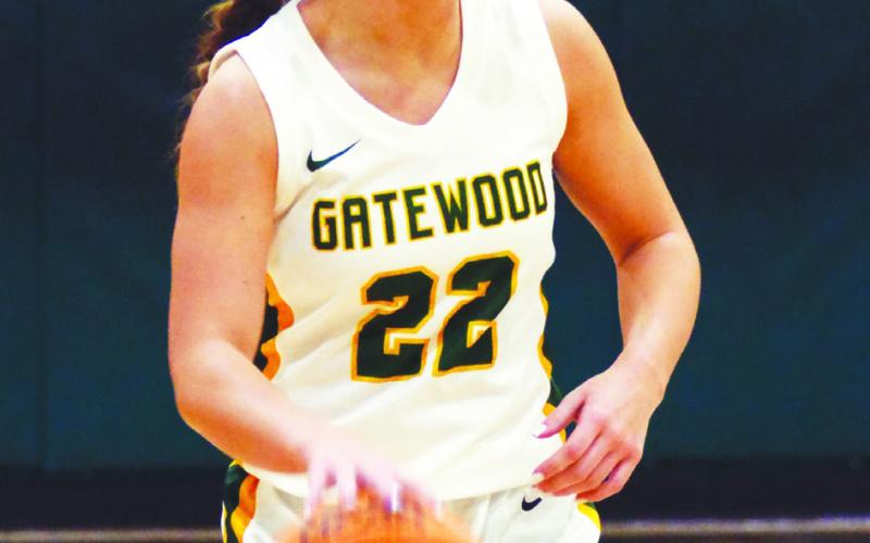 Junior Natalie Sills brings the ball up the floor for the Lady Gators. IAN TOCHER/Staff