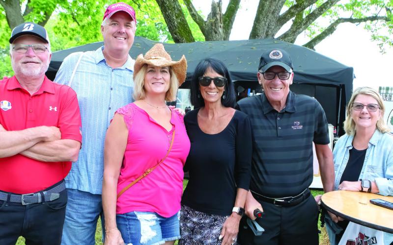 Among the happy barbecuers were Fred and Linda Fogel, Bob and Roxanne Welsh and Roger and Donna Franz. LEIGH LOFGREN/Staff