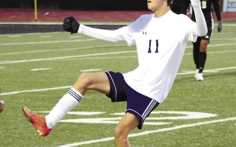 Colin Garafolo (11) attempts a bicycle kick. ARELLA CASH/Staff