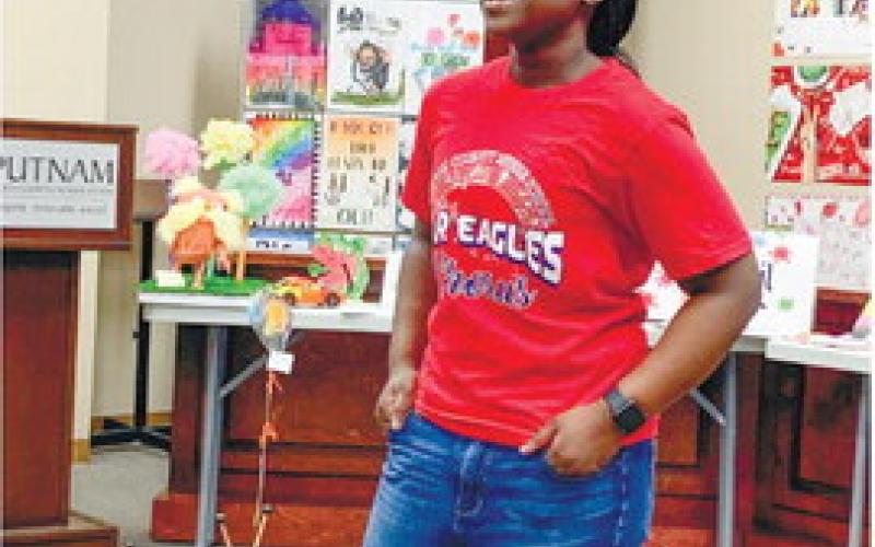 Sixth grader Kenzie Nelson sings an impromptu chorus short from “In My Own Little Corner” from Rodgers and Hammerstein’s Cinderella.