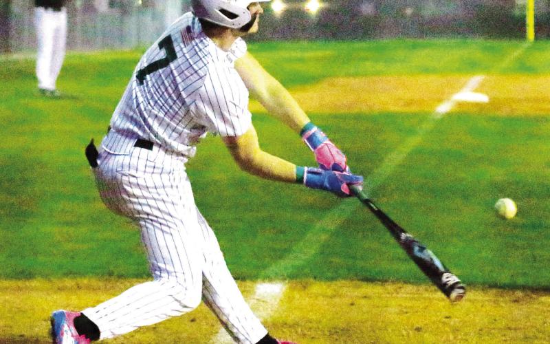 Gatewood senior Ames Johnson drives a ball the opposite way. TREY NORRIS/Staff