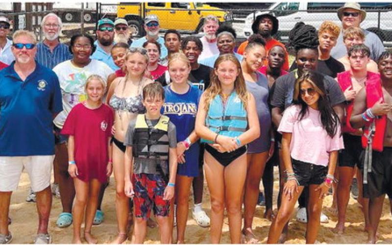 Sta_ and youth residents of the Masonic Home of Georgia joined local Masons from Eatonton Aug. 20, at Oconee Springs Park. IAN TOCHER/Staff