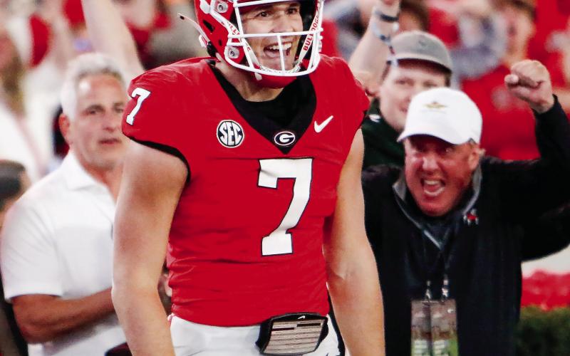 Georgia tight end Lawson Luckie (7) celebrates after hauling in a six-yard touchdown catch against Texas. LANCE McCURLEY/Staff