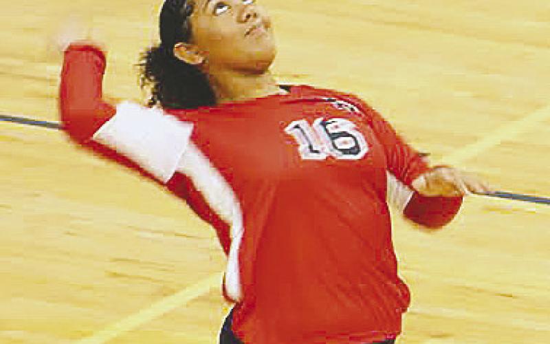 Trina Tracey gets set to serve for the Lady War Eagles against Butler. ARELLA CASH/Staff