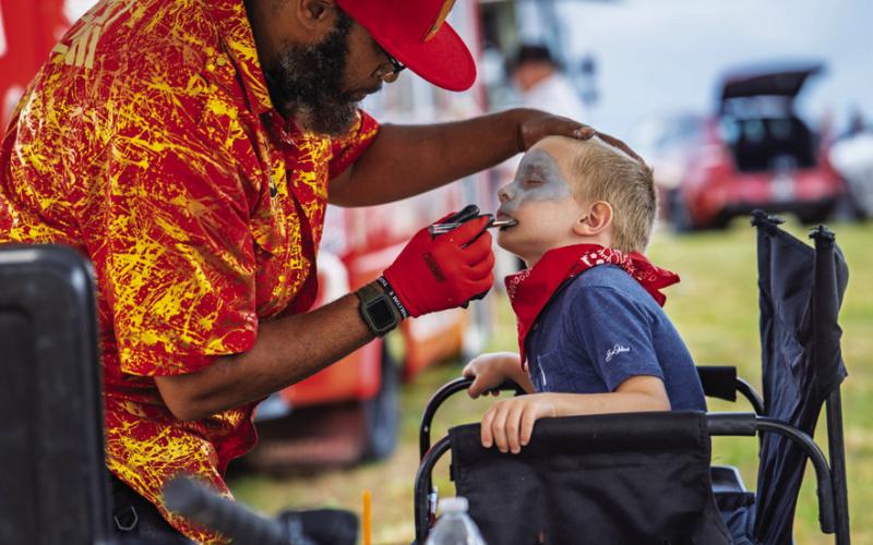 Younger music fans had plenty to see and do as well, including getting their faces painted for the OPAS occasion.