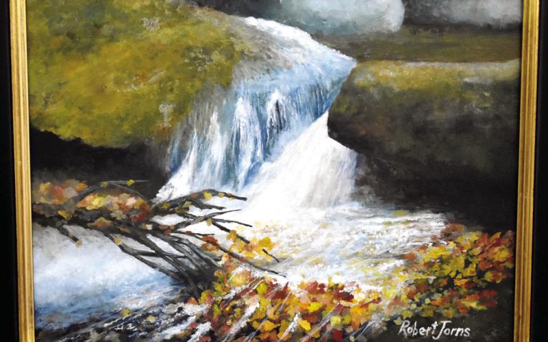 A piece called “Fall Leaf Dam” by Robert Jorns. Jorns picked the pieces of his exhibit based on landscapes he felt best represented the area. CONTRIBUTED
