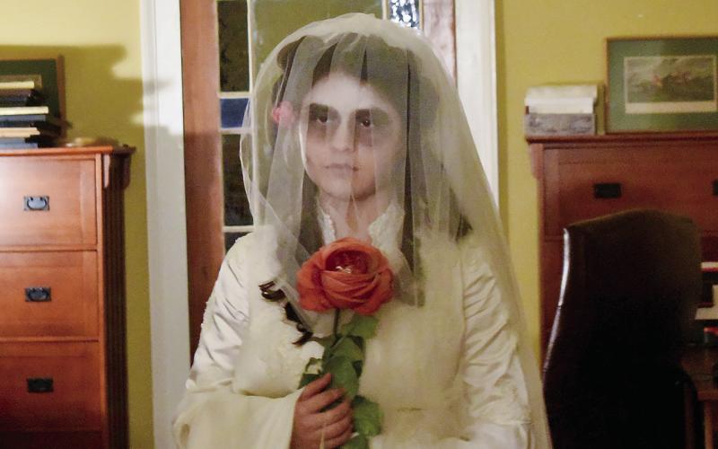 Sylvia, the famed ghost of Panola Hall, greets visitors during Haunted Eatonton. HANNAH BARRON/Staff