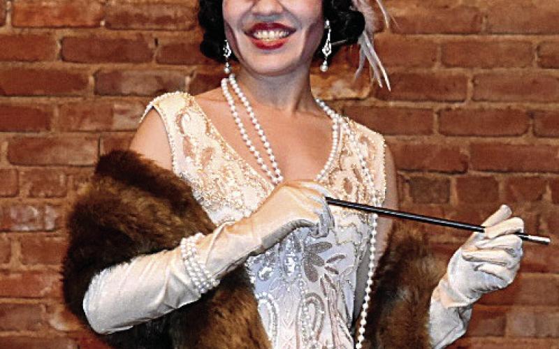 Connie, a ghost from the Roaring Twenties, enjoys the spotlight at the historic Adele Theater. HANNAH BARRON/Staff