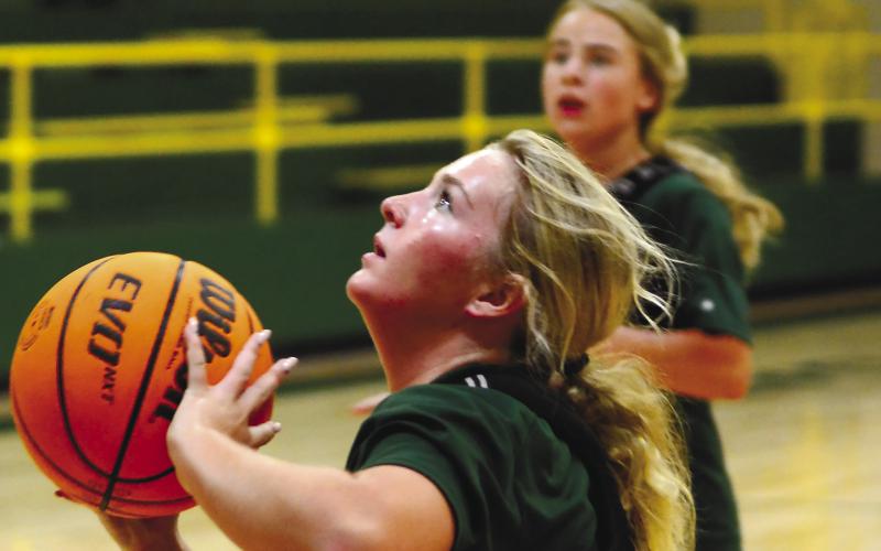 Gatewood rising 10th-grader Lily Huskins attempts a jump shot during Tuesday’s practice. IAN TOCHER/Staff