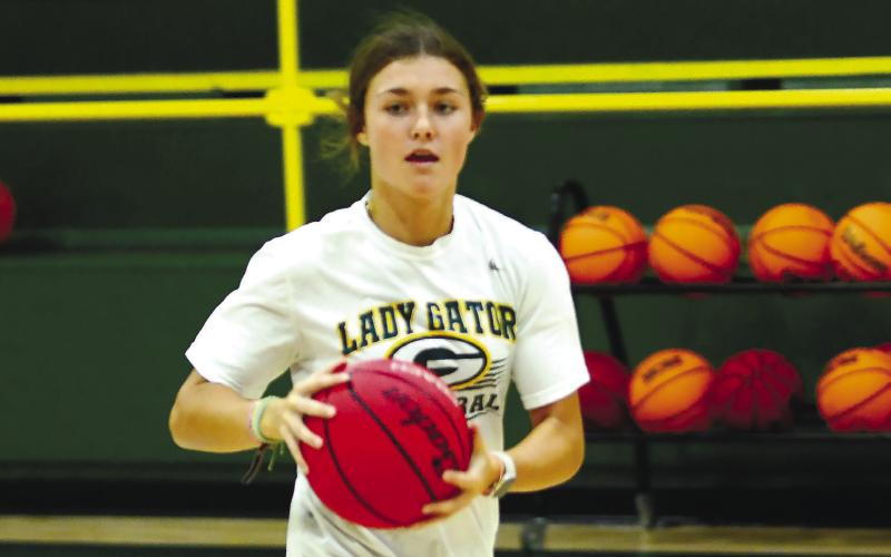 Rising 10th-grader Natalie Sills looks for a teammate to pass the ball to. IAN TOCHER/Staff