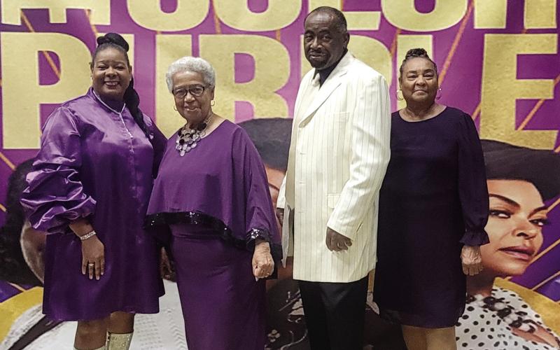 Eatonton’s own Georgia Benjamin-Smith (second from left) and Brenda Bonner (far right) were among the premiere goers foe “The Color Purple” on Christmas Day at Parkside Main 8. CONTRIBUTED