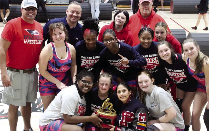 The Putnam County girls wrestling team poses for a photo after winning the area duals tournament earlier this month. KIM CASH/Contributed