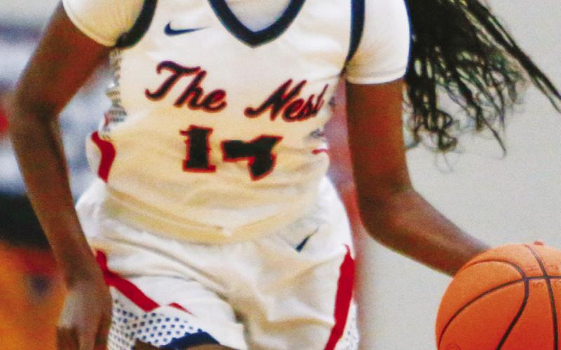 Putnam County senior Jaikarccie Smith (14) has been a key role player for the team this season. LANCE McCURLEY/Staff