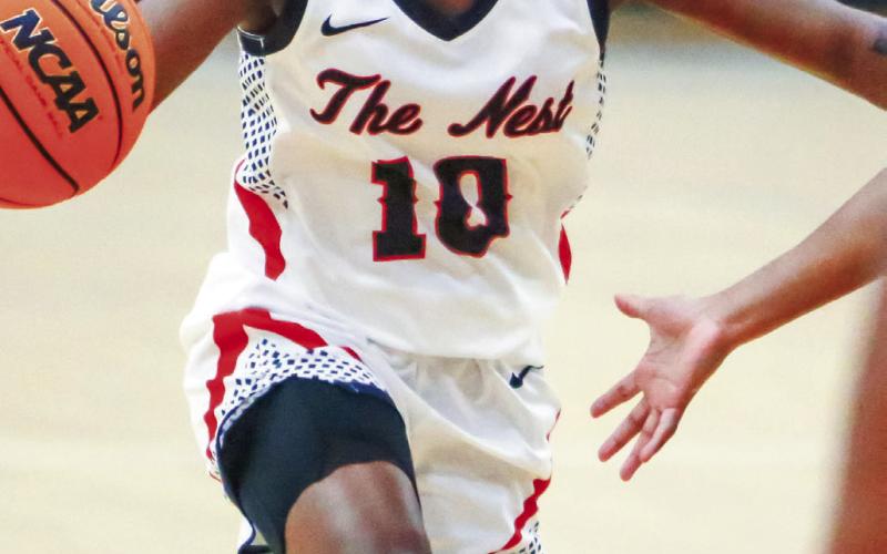 Putnam County junior Journey Waller (10) is the Lady War Eagles’ leading scorer, averaging 11.8 points per contest through 18 games. LANCE McCURLEY/Staff