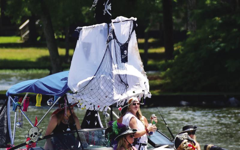 Pour Decisions owner Beth Edwards rode up front and said she left the navigating to “a friend who’s a much better boat driver than me!”