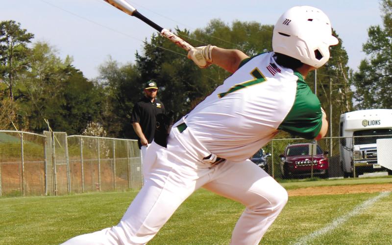 Gatewood’s Ames Johnson (7) takes a cut at the plate during a previous game at home in Eatonton. TREY NORRIS/Staff