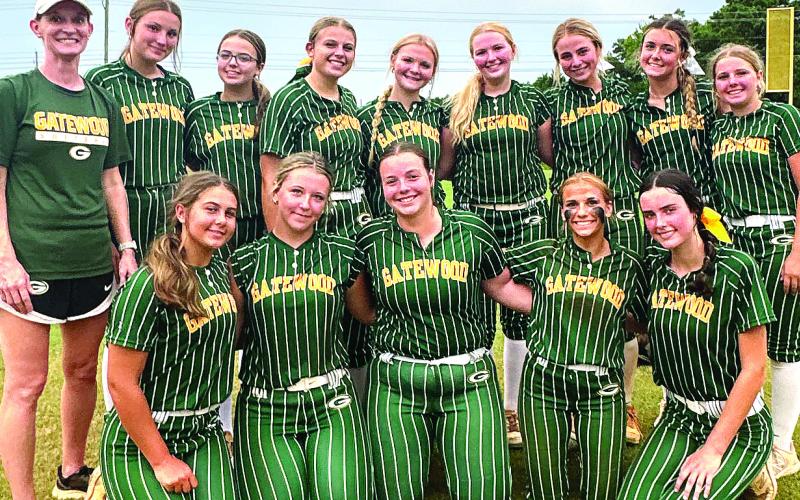 The Gatewood softball poses for a team photo after defeating Trinity Christian in the season opener last week. CONTRIBUTED