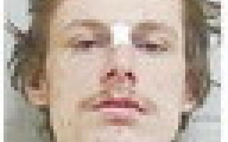 Wanted man nabbed after run through real briar patch