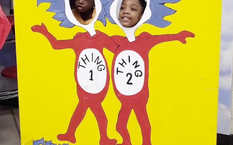 Two students pose as Thing 1 and Thing 2 during a previous Seuss on the Loose. CONTRIBUTED
