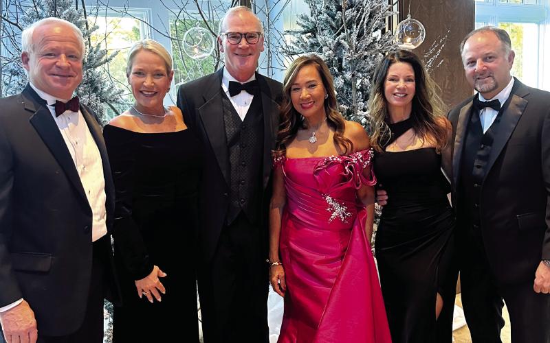 Winter Ball Sponsors Jim and Tammy Beatty, Ted and Riezl Baker, and Matt and Daniela Garofalo. CONTRIBUTED