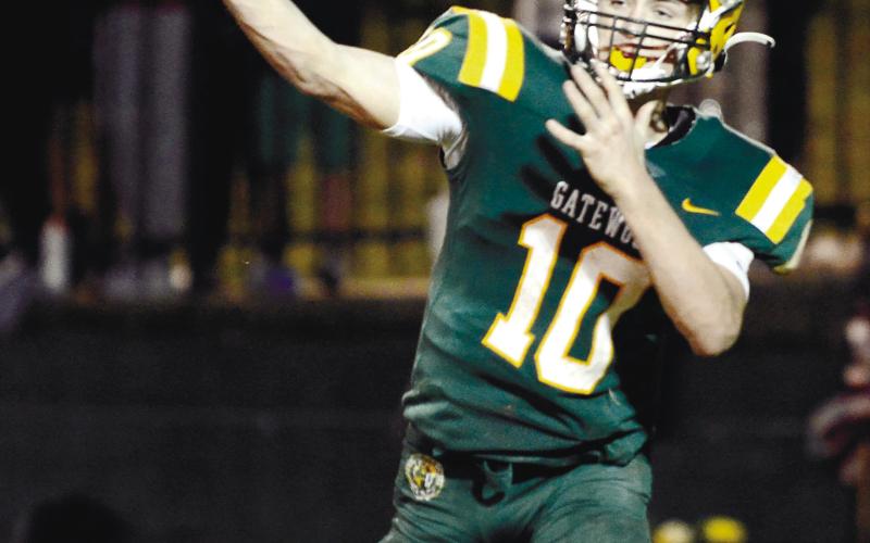 Gators quarterback Ames Johnson had another strong game last Friday in Monticello, scoring three touchdowns and throwing for another in Gatewood’s 36-18 win over Piedmont Academy. IAN TOCHER/File