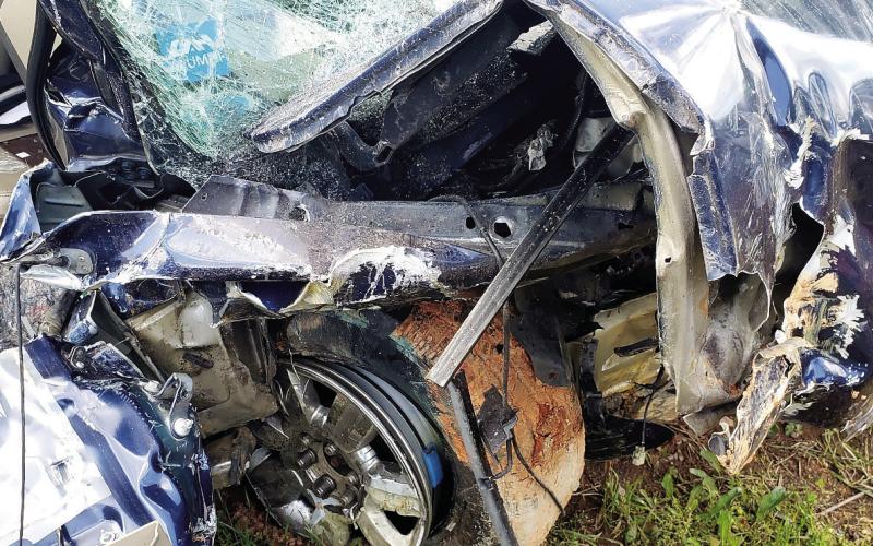 A Ford F150 driven by 21-year-old Omar Palacos-Balderas shows severe damage from an early Friday morning crash into parked construction equipment alongside Hwy. 441 north of Eatonton. CONTRIBUTED