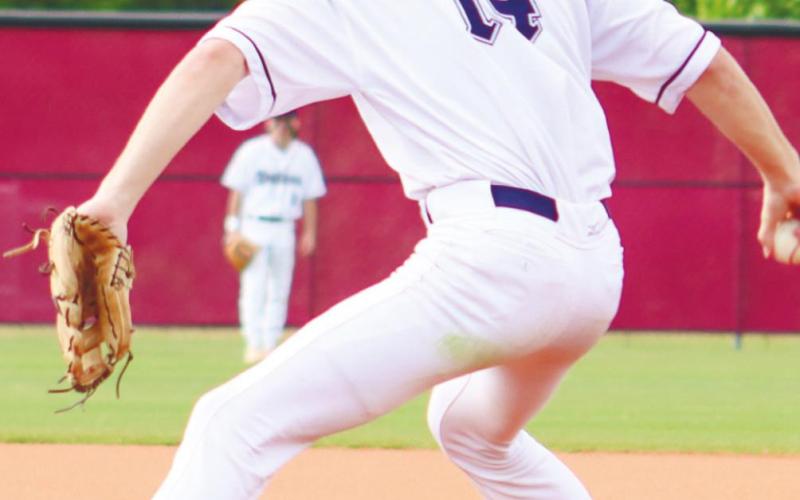 Chase Lupton (14) on the hill, getting ready to fire a pitch to a Vidalia hitter. ARELLA CASH/Staff