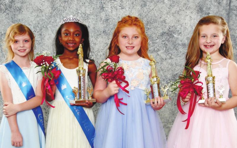First through second grade Petite Miss court (L-R); Miss Congeniality, Anna Caroline Rountree; 2022 Petite Miss Queen, Noelle Grace White; Second runner up, Piper Rose Rainey; First runner up, Sadie Moran MARK TURNER/Contributed