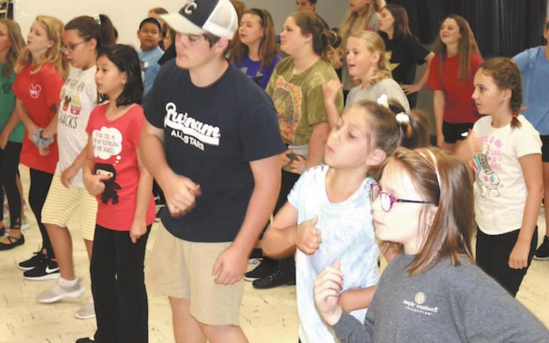 Kids participate in an activity at the Kids’ U Theatre Camp. CONTRIBUTED