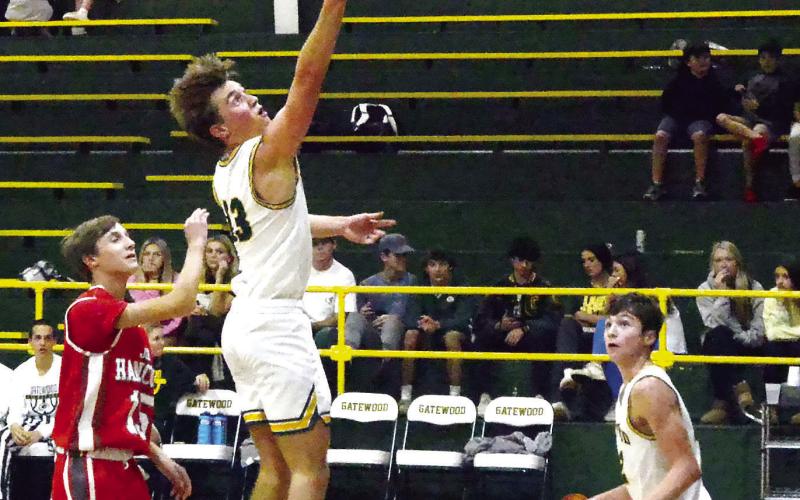 Junior Kaden Keiser (13) has enjoyed a good start to his season with the Gators, as has sophomore and team-leading scorer Matt Allen (right)