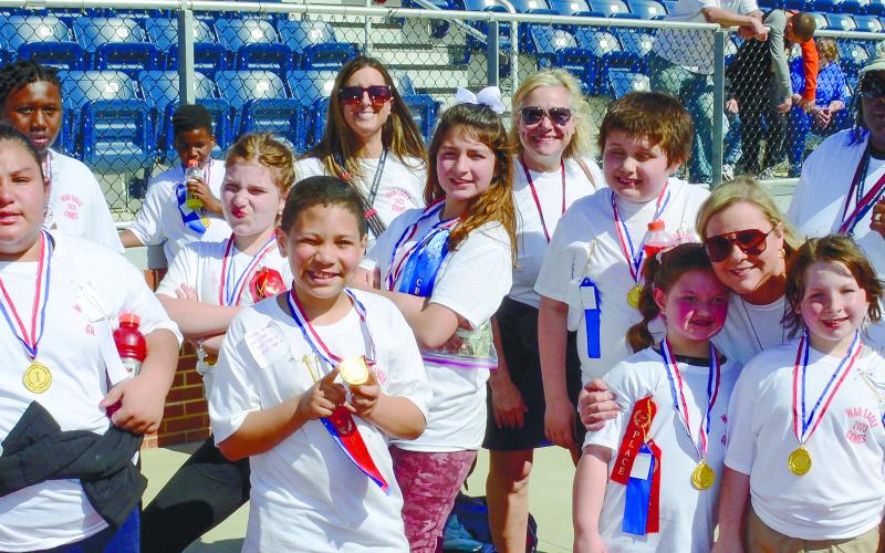 Student-athletes from each school within the Putnam County Charter School System wore matching color event t-shirts, with the team from Putnam County Elementary decked out in white.