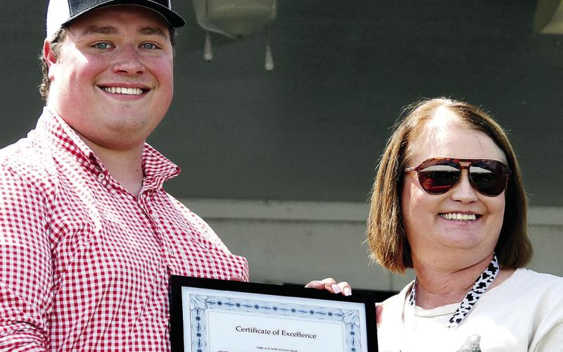 Executive Director Bryce Trotter received the 2025 Dairy Award on behalf of Georgia Milk Producers Inc. IAN TOCHER/Staff