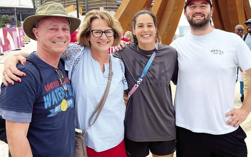 Sylvia’s Coffee owners Michael and Diana Homeier and their son, Gabriel, attended the Paris Olympics earlier this summer. Michael and Diana’s niece, Rachel Fattal (center), was playing on Team USA’s water polo team. (CONTRIBUTED)