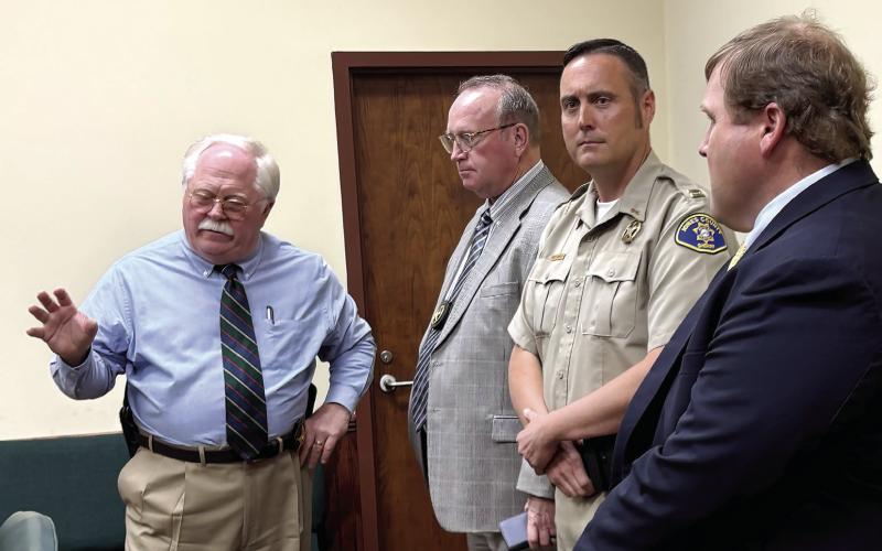 L-R: Putnam County Sheriff Howard Sills, Jones County Sheriff’s Office Chief Deputy Earl Humphries, Capt. Travis Douglas and Investigator John Simmons at a May 16 press conference. DEBBIE LURIE-SMITH/Staff