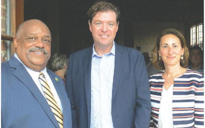 Eatonton Mayor John Reid (left), joined John Drew Jr. and Theonie Alicandro of the Drew Company in announcing plans to renovate the Old Hotel Eatonton.