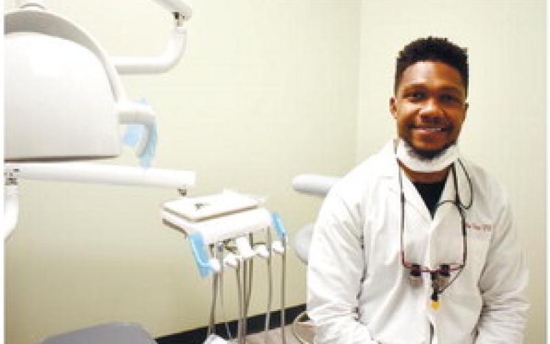 Dr. Oliver returned to his hometown of Eatonton to o_er his talent to the community that helped him achieve his dream of becoming a dentist. BAILEY BALLARD/Staff