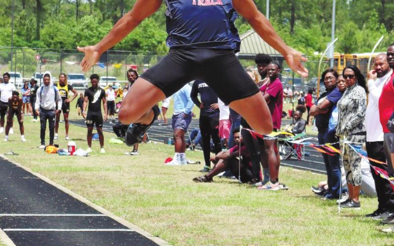 Gerald Kilgore finishes seventh in the long jump and heads to state in that event. ARELLA CASH/Staff
