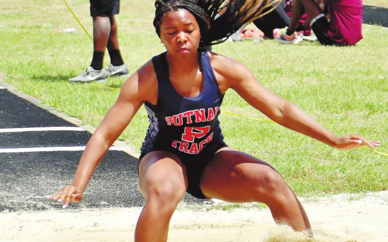 Halana Griffin competes in the triple jump. ARELLA CASH/Staff