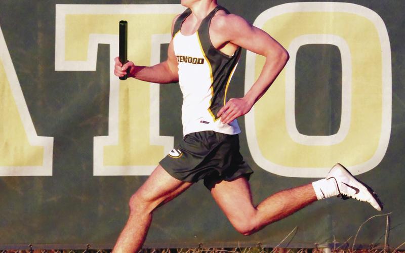 Kaden Keiser competes in one of the relay heat races for the Gators. IAN TOCHER/Staff