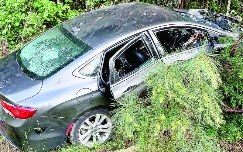 Seven people were fortunate to all escape injury in this crashed car early this month on Hogan Industrial Boulevard. LYNN HOBBS/ Staff