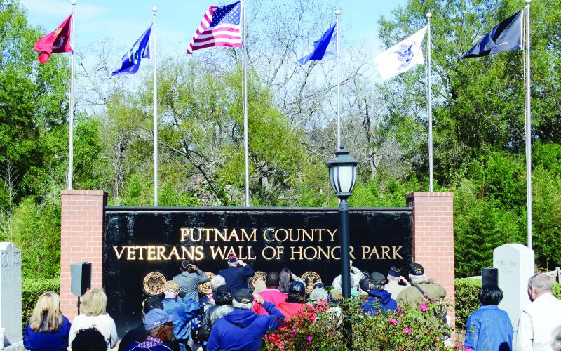 Originally designed by Bob Landau and dedicated to Veterans Day 2014, the wall anchors the 15,500-square-foot Putnam County Veterans Wall of Honor Park, a little west of downtown Eatonton alongside West Marion Street. (IAN TOCHER/Staff)