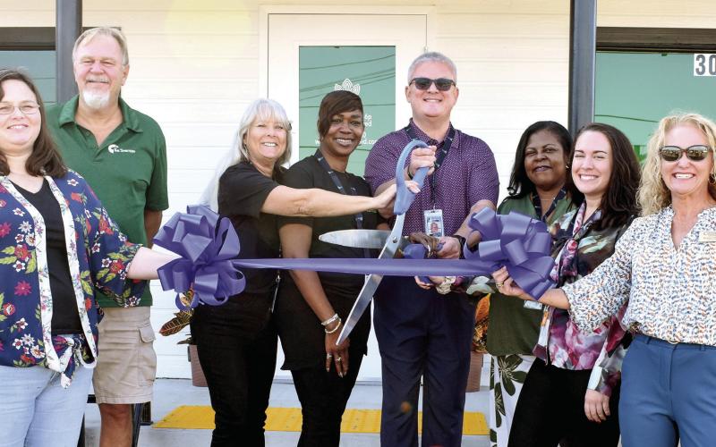 Treevana Powered by Sanctuary staff and the Milledgeville-Baldwin Chamber of Commerce cut the ribbon Sept. 9 to officially open the first medical cannabis facility in Milledgeville. BAILEY BALLARD/Staff