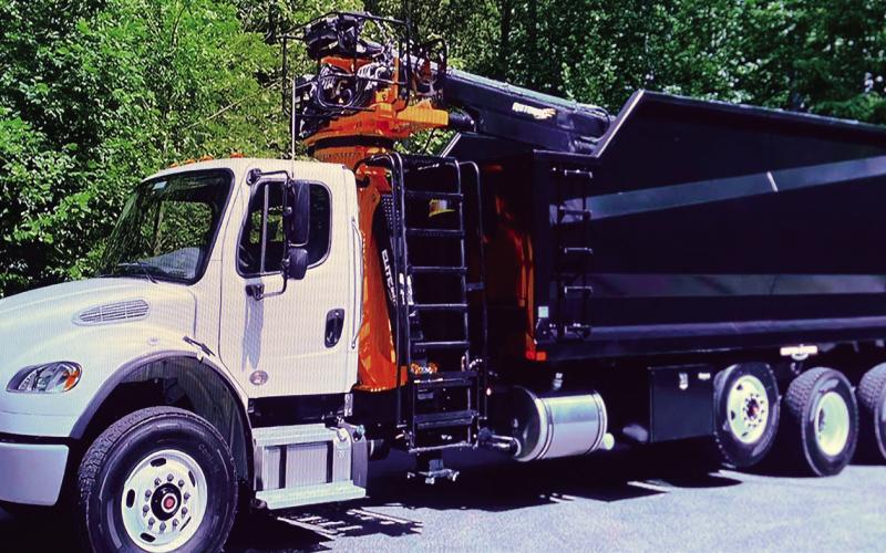Commissioners agreed to spend nearly $320K on a new Public Works truck equipped with a boom, grappling equipment, and a dump bed to make roadside storm and debris cleanup quicker and less labor intensive. IAN TOCHER/Staff