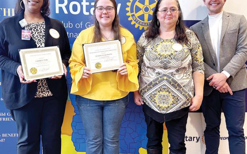 L-R: Dr. Candice Veal, Claudia Franklin,and Wanda Nix of Putnam County High School pose with Dr. Tyler Franks. CONTRIBUTED